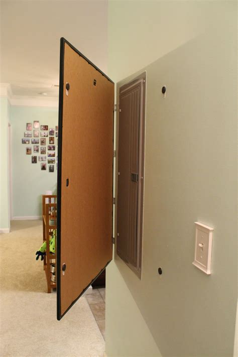 creative ways to cover over electrical boxes on house|hide electrical breaker box.